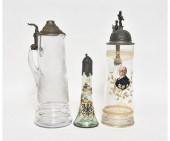 Three glass steins, one large