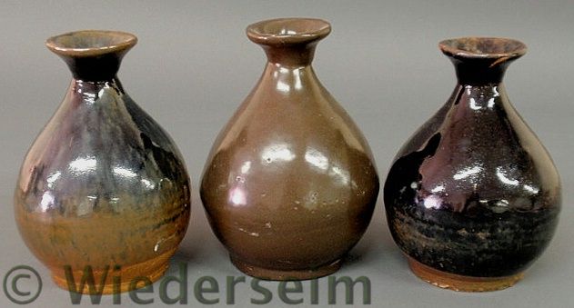 Three glazed ceramic vases