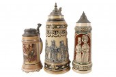 THREE GLAZED POTTERY BEER STEI