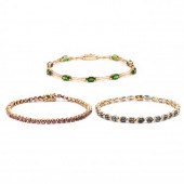 THREE GOLD AND GEM-SET BRACELE