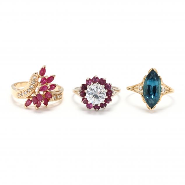 THREE GOLD AND GEM-SET RINGS To