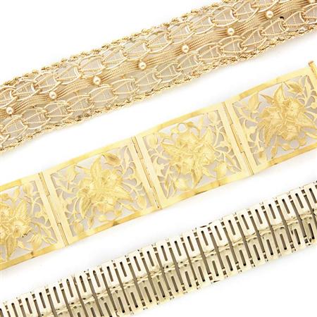 Three Gold Bracelets 	 