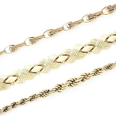 Three Gold Bracelets 	 