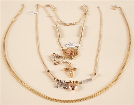 Three gold chain necklaces 29