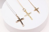 THREE GOLD CROSS PENDANTS. Ame