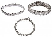 THREE GOLD FANCY LINK BRACELET
