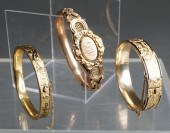 THREE GOLD FILLED BANGLE BRACE