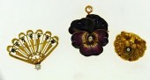 THREE GOLD PINSThree gold pins