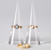 THREE GOLD RINGSThree gold rin
