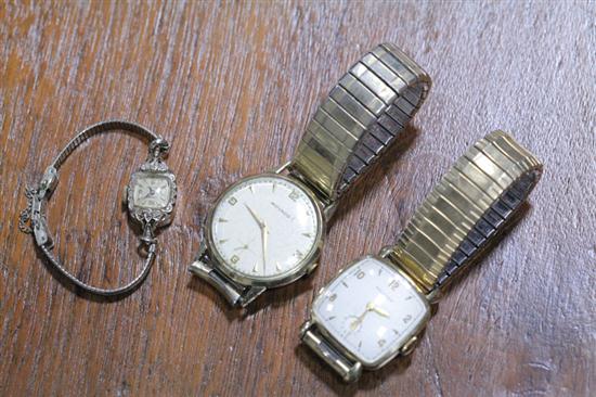 THREE GOLD WRIST WATCHES.