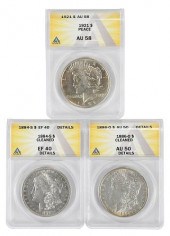 THREE GRADED SILVER DOLLARS188
