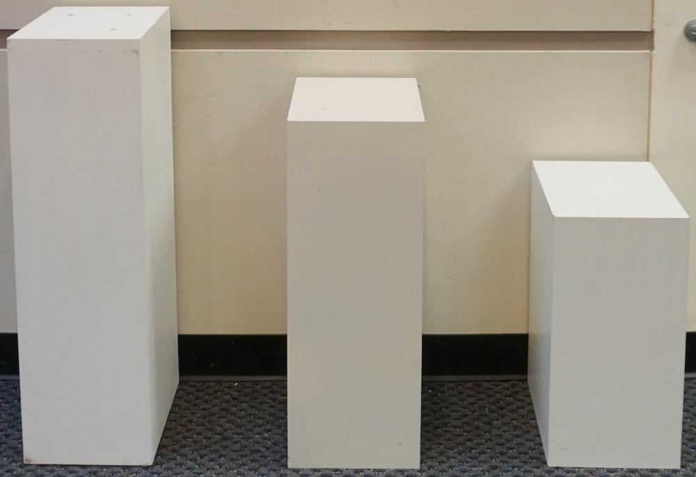 THREE GRADUATING WHITE ENAMEL