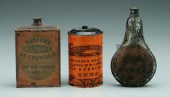 Three gunpowder tins: one flas