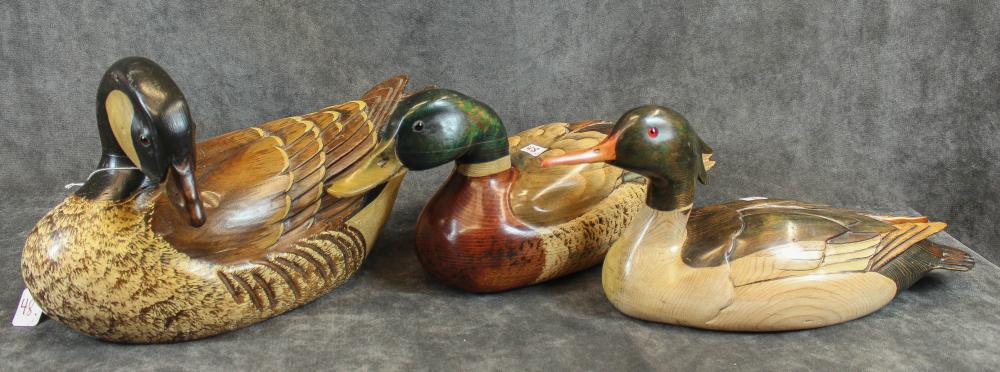 THREE HAND CARVED DECORATIVE