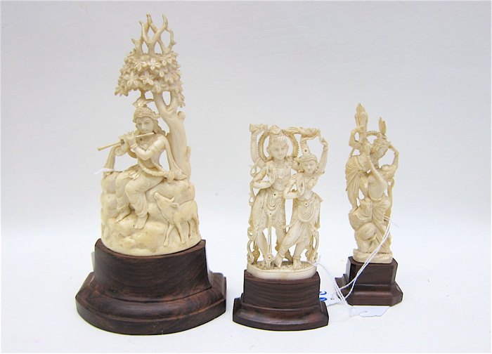 THREE HAND CARVED IVORY FIGURES