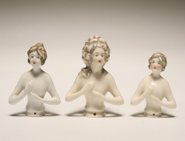 Three hand painted porcelain half