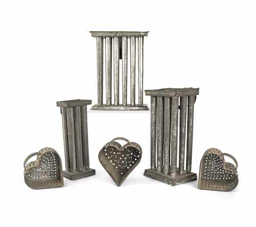 Three heart form cheese molds