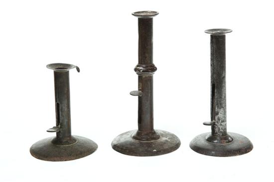 THREE HOGSCRAPER CANDLESTICKS. 