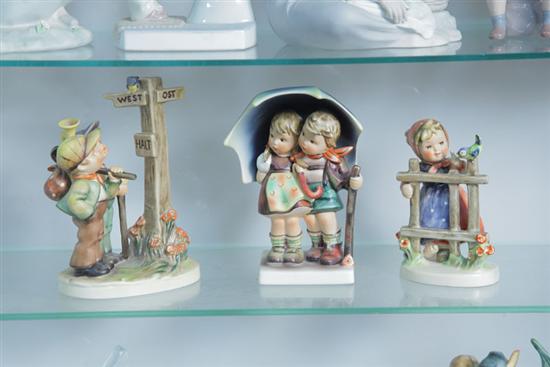 THREE HUMMEL FIGURINES.