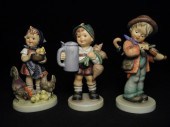 Three Hummel porcelain figurin