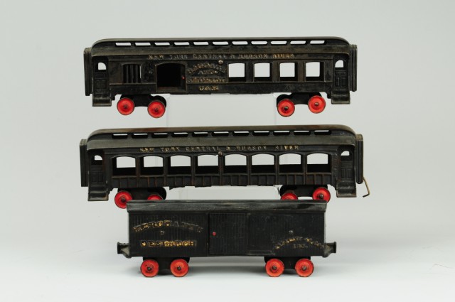 THREE IDEAL CAST IRON TRAIN CARS