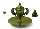 Three inkwells: urn-shaped bra