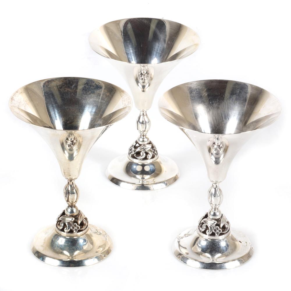 THREE INTERNATIONAL STERLING