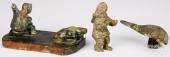 THREE INUIT CARVED STONE FIGUR