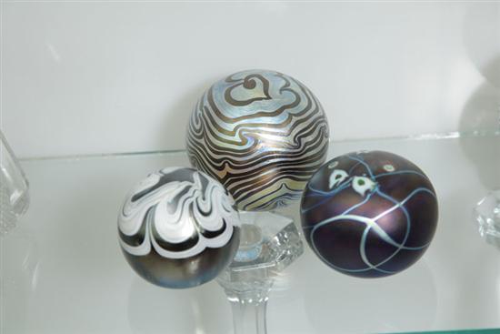 THREE IRIDESCENT PAPERWEIGHTS.
