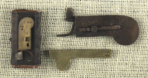 Three iron and brass bleeders