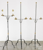 THREE IRON AND BRASS CANDLESTA