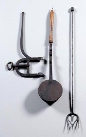 Three iron kitchen implements: