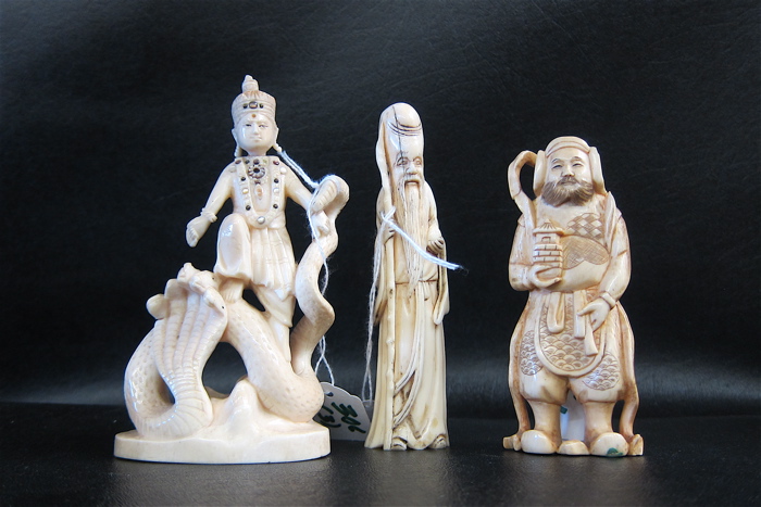 THREE IVORY CARVED CHINESE FIGURES: