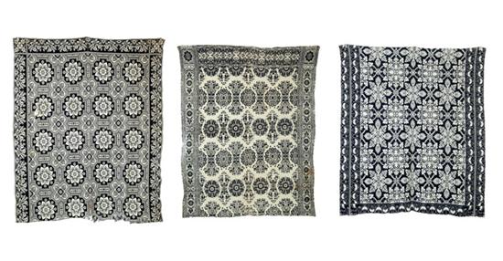 THREE JACQUARD COVERLETS.  American