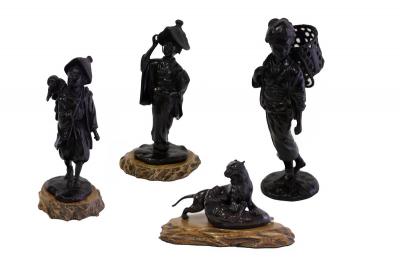 Three Japanese bronze figures,