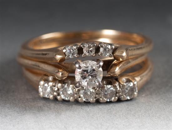 Three lady's 14K gold and diamond