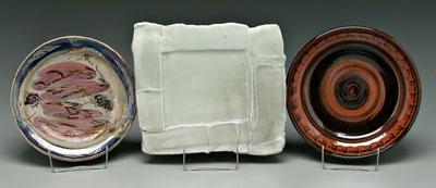 Three large ceramic plates,