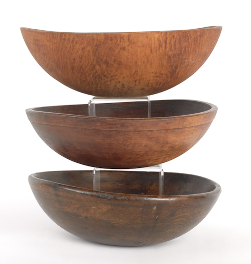 Three large turned wood bowls