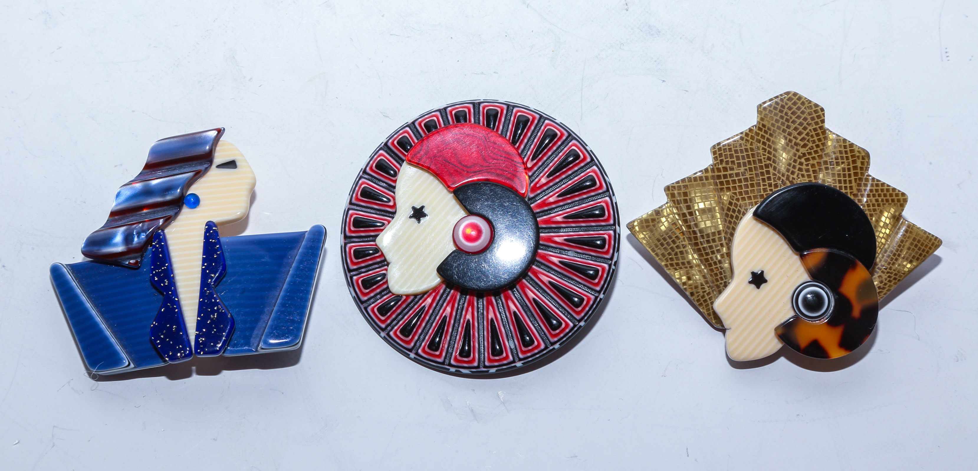 THREE LEA STEIN ART DECO BROOCHES