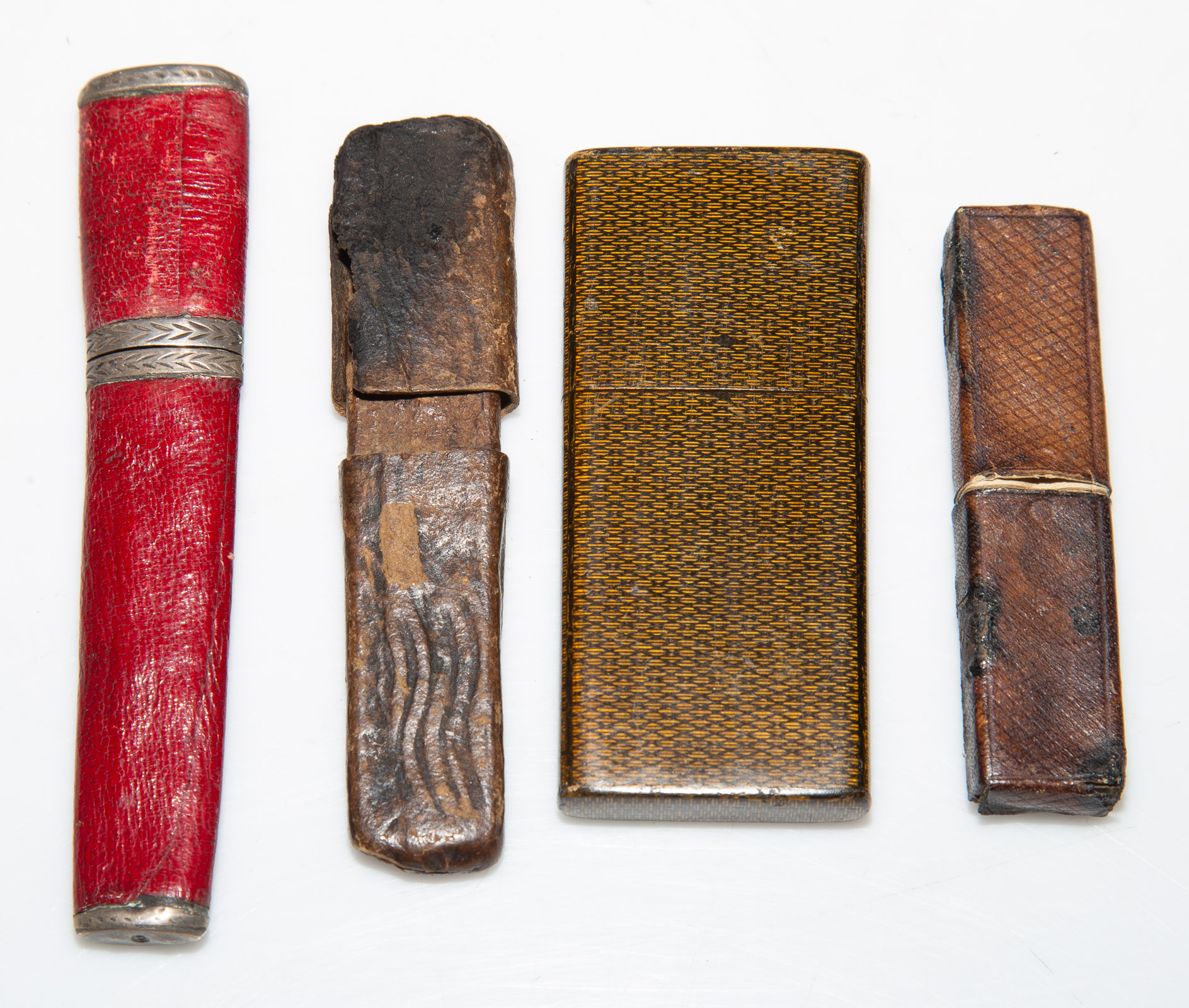 THREE LEATHER & A LACQUER-CASED