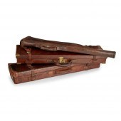 THREE LEATHER SHOTGUN CASES
LA