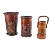 THREE LEATHER STICK STANDS INC