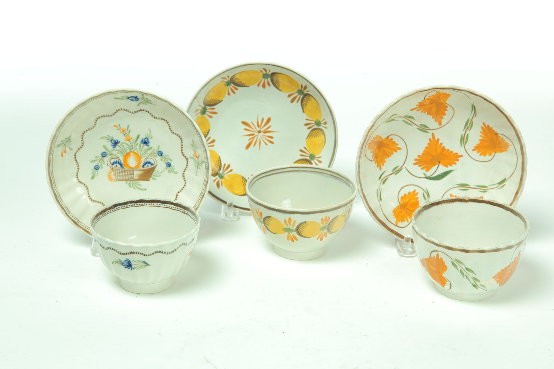 THREE LEEDS HANDLELESS CUPS AND