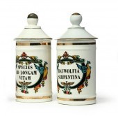 THREE LIDDED APOTHECARY JARS.