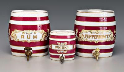 Three lidded ceramic canisters, all