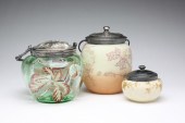 THREE LIDDED GLASS JARS. Fourt