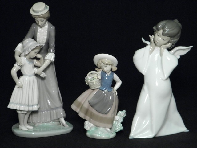 Three Lladro porcelain figurines.