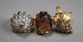 THREE LOW PURITY GOLD AND STON