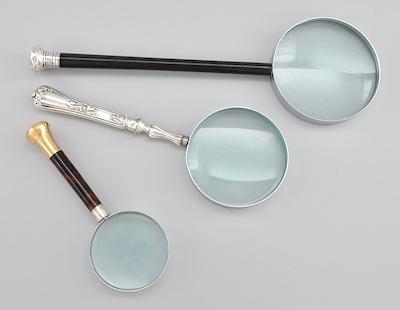 Three Magnifying Glasses with