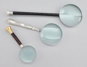 Three Magnifying Glasses with